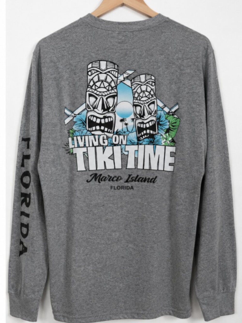 5/50$ or 10/90$

athletic long sleeve tiki hut tee